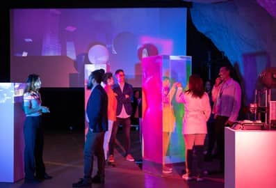 Attendees meeting and networking at a fintech event