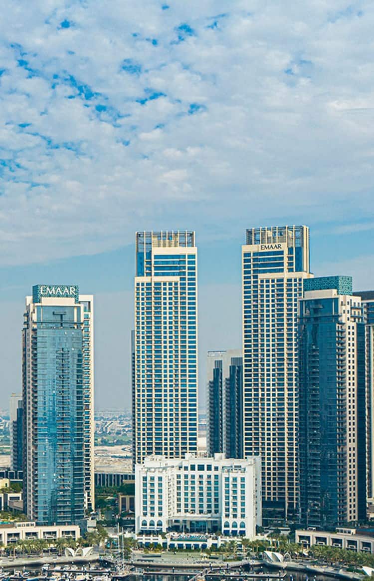 Cluster of modern glass skyscrapers under a clear sky