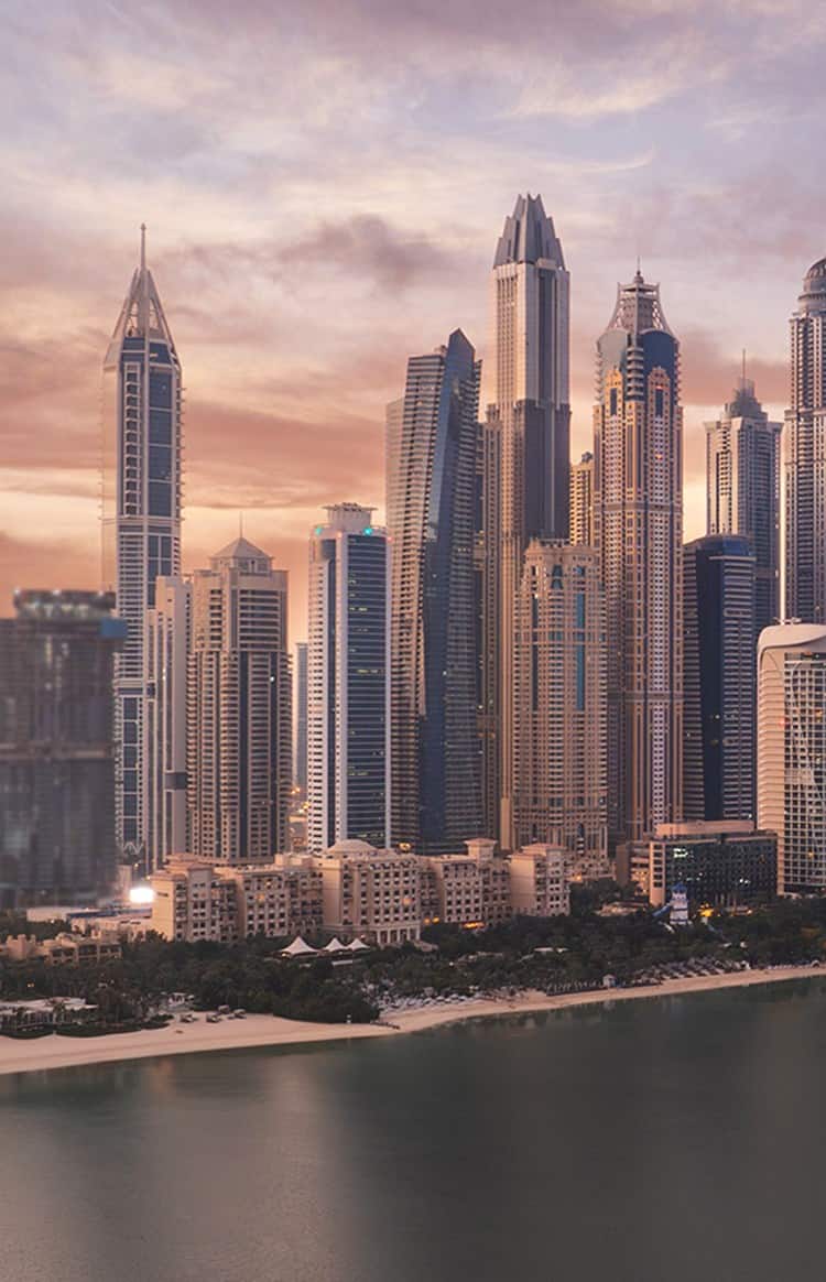 Dubai skyline and waterfront viewed at sunset