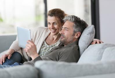 Older couple relaxing together at home